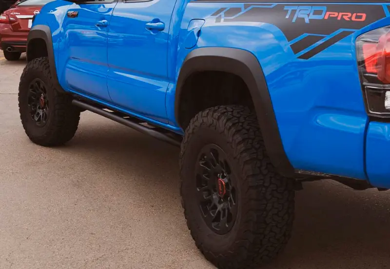 Cali Raised Trail Edition Rock Sliders For 2005–2023 Toyota Tacoma – Double Cab Long Bed, Kick-Out Design, Raw Finish 1